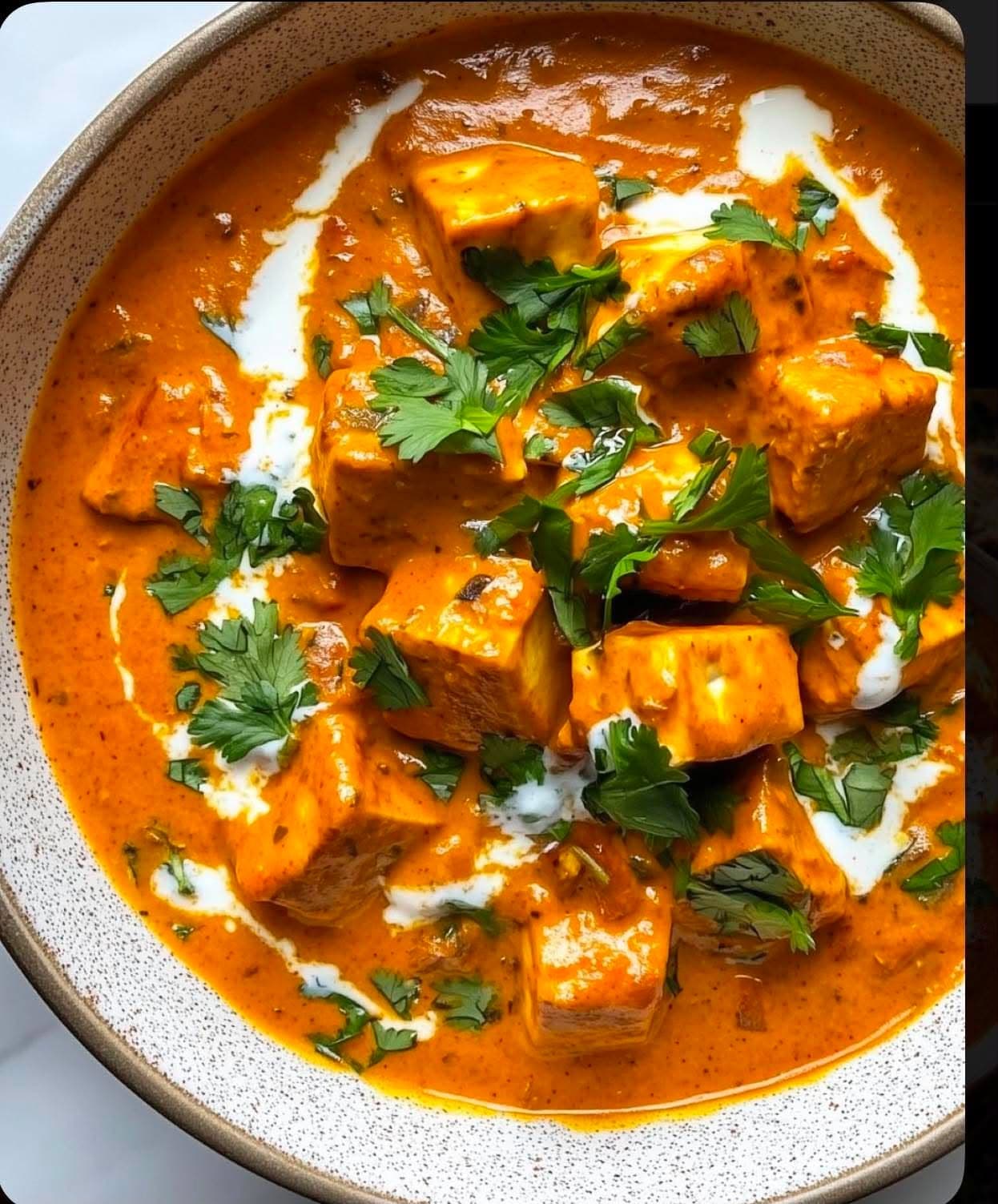 Paneer Butter Masala with cream and coriander