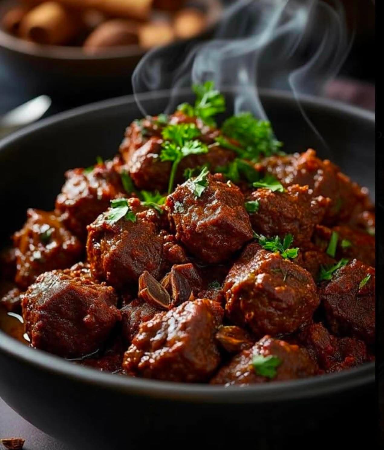 Mutton Rogan Josh, slow-cooked in an aromatic onion gravy